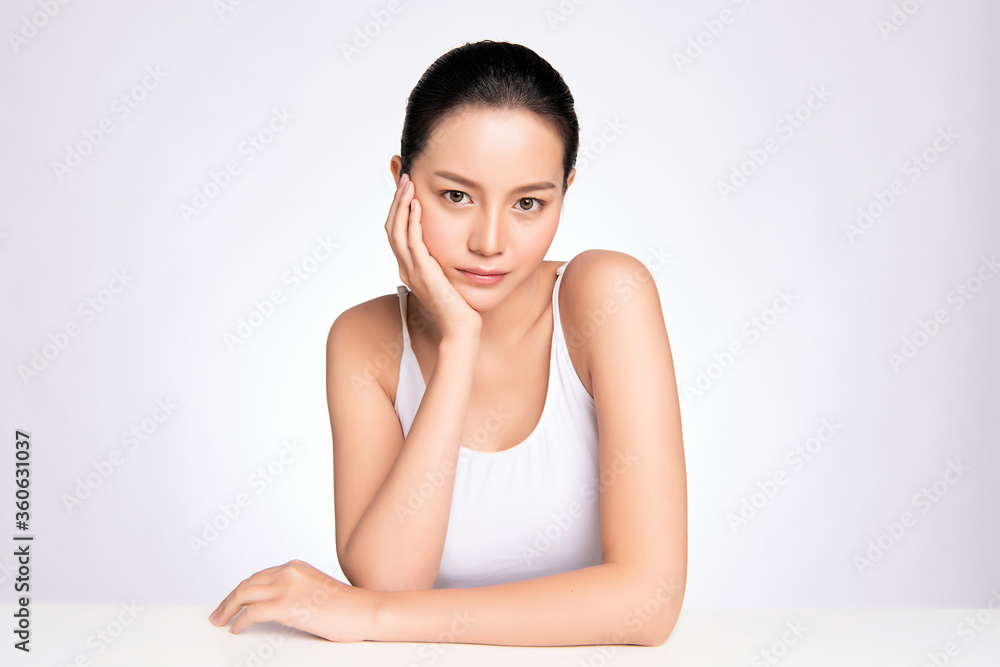 Beauty Woman face Portrait, Beautiful Young Asian Woman with Clean Fresh Healthy Skin, Facial treatment. Cosmetology, beauty and spa, isolated on white background. Beauty Woman face Portrait, Beautiful Young Asian Woman with Clean Fresh Healthy Skin, Facial treatment. Cosmetology, beauty and spa, isolated on white background.