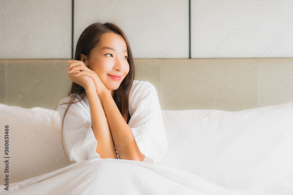 Portrait beautiful young asian woman relax happy smile in bedroom Portrait beautiful young asian woman relax happy smile in bedroom