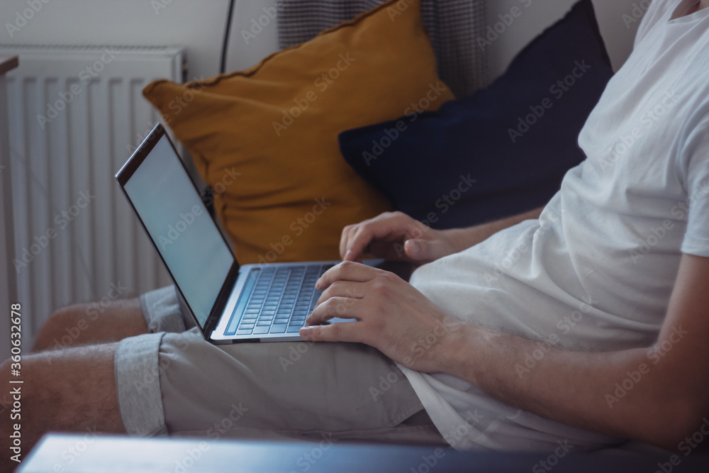 A beautiful young student using a digital tablet device at home, a hipster man sitting in a chair in a cozy interior using a laptop computer, a freelancer working in a cafe A beautiful young student using a digital tablet device at home, a hipster man sitting in a chair in a cozy interior using a laptop computer, a freelancer working in a cafe
