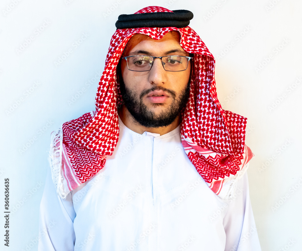 Arabic man standing alone with white background Arabic man standing alone with white background