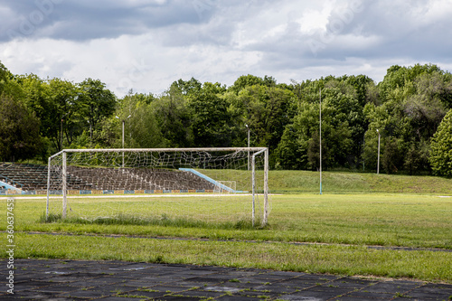 old white gate on the football field. Sports outdoors