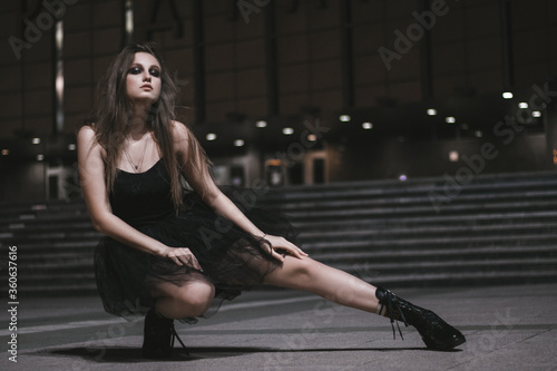 young woman in black dress