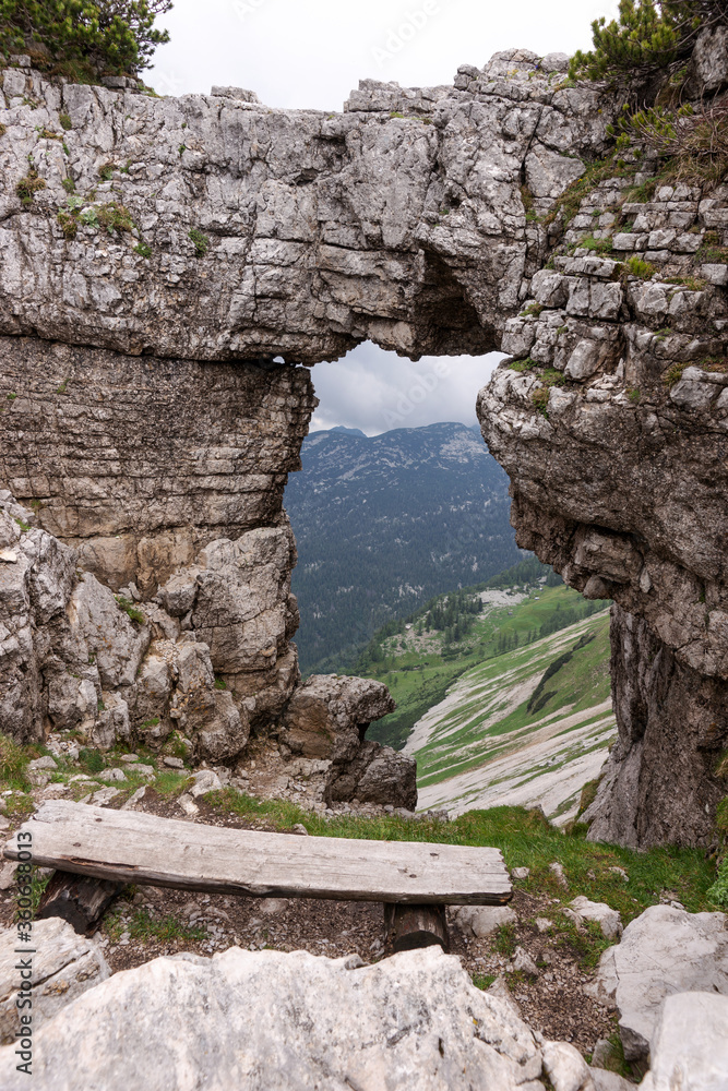 View of the mountains from rock window in Loser peak. Dead Mountains (Totes Gebirge) in Austrian Alps