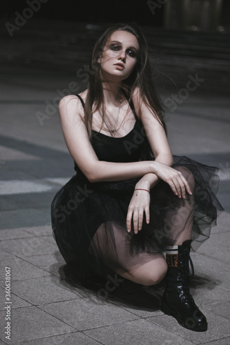 young woman in black dress