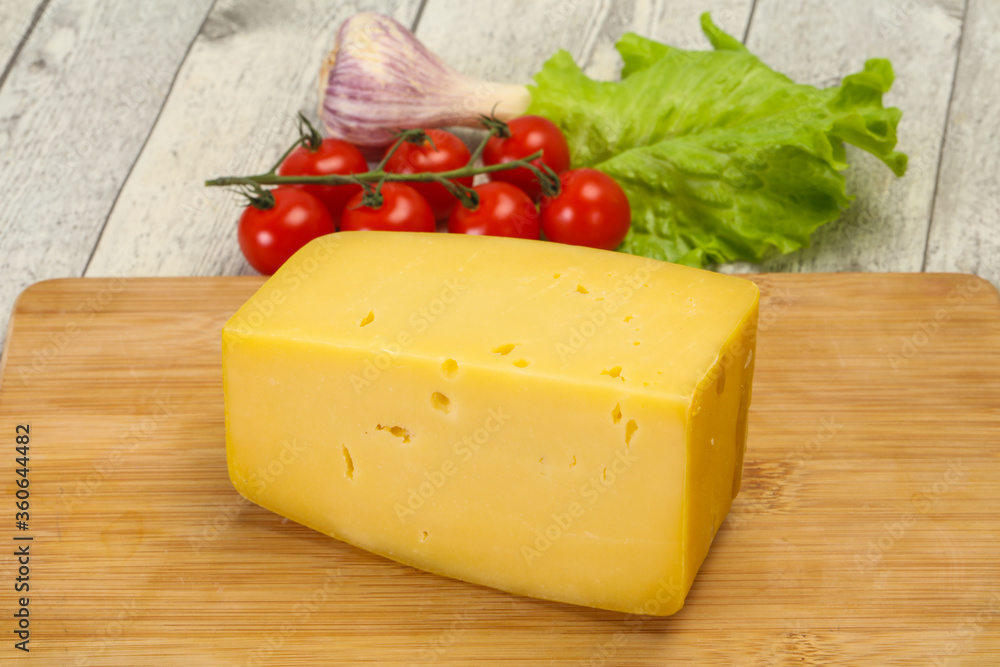 Hard yellow tasty cheese brick Hard yellow tasty cheese brick