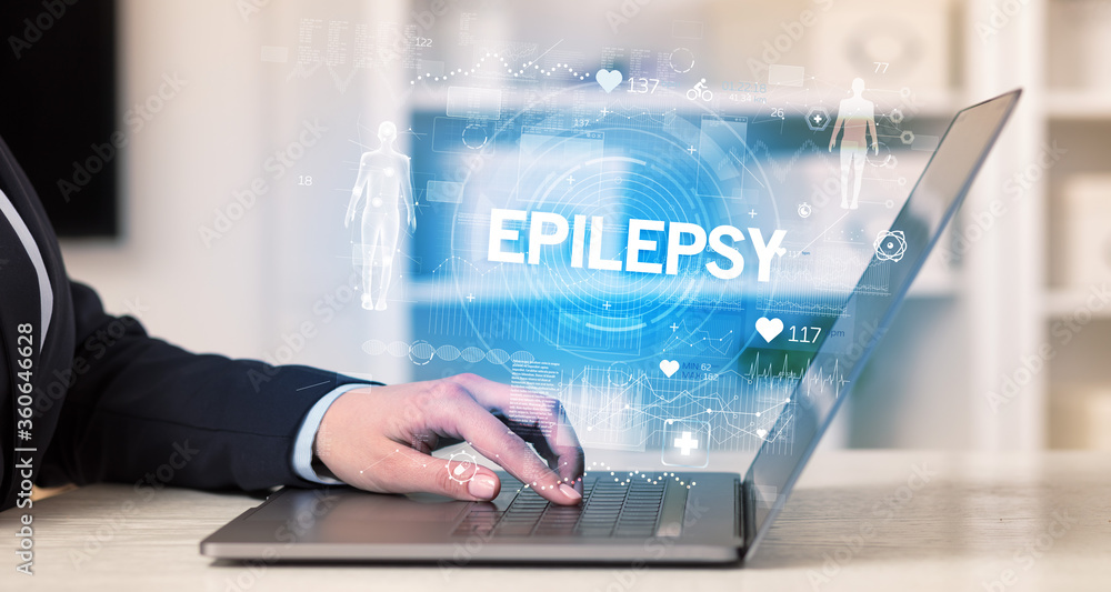 Doctor working a health check with EPILEPSY inscription, recording medical test results Doctor working a health check with EPILEPSY inscription, recording medical test results