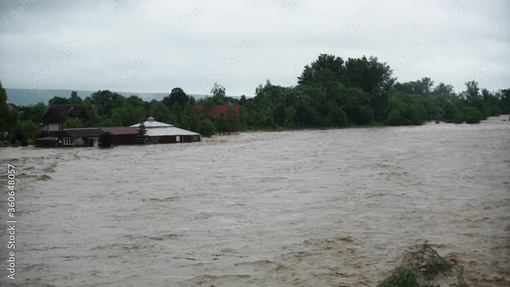 Natural disaster . Dirty water. After heavy rain. Cataclysm.Flooding .Fast flowing raging river. Soil and mud is moving towards down. After strong rain. Natural disaster . Dirty water. After heavy rain. Cataclysm.Flooding .Fast flowing raging river. Soil and mud is moving towards down. After strong rain.