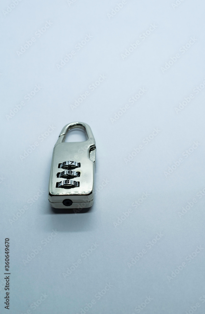 A lock on a plain white background. Selective focus, Selective focus on subject, background blur A lock on a plain white background. Selective focus, Selective focus on subject, background blur