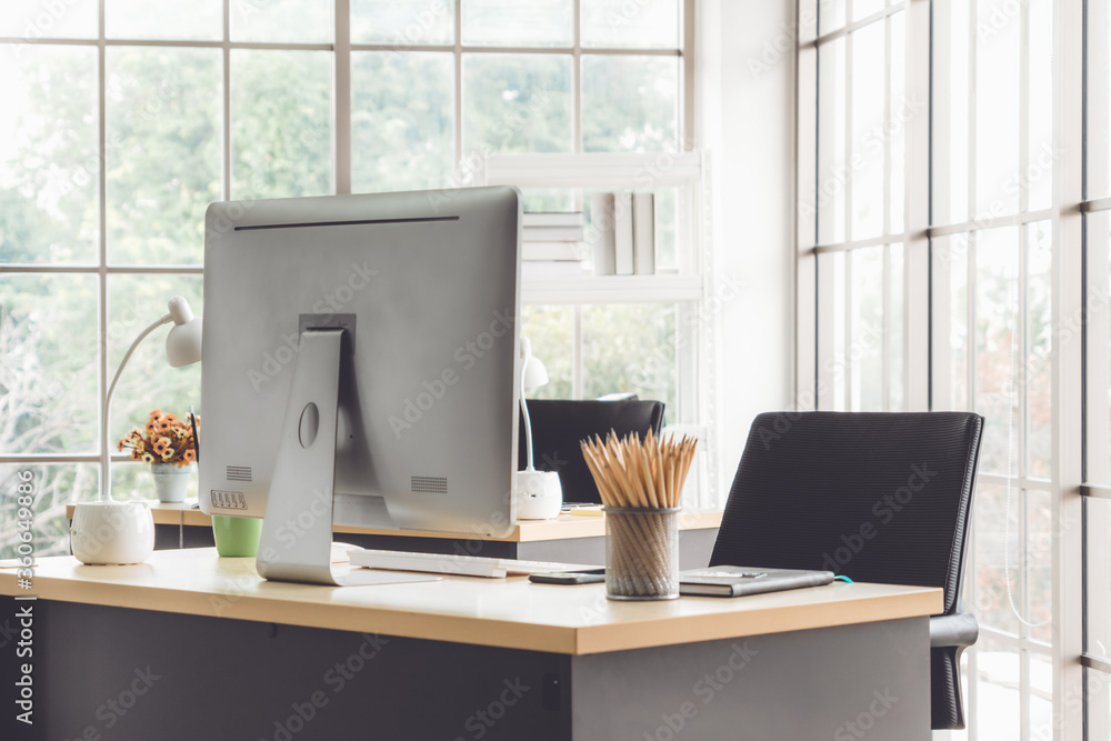Desktop PC computers in small modern office or home office. Trendy  workplace interior. Stock-foto | Adobe Stock