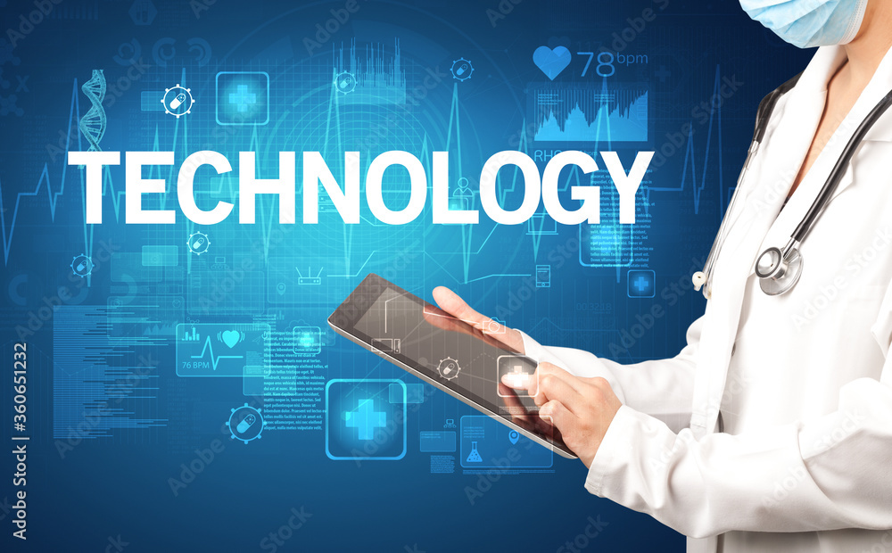 young doctor writing down notes with TECHNOLOGY inscription, healthcare concept young doctor writing down notes with TECHNOLOGY inscription, healthcare concept