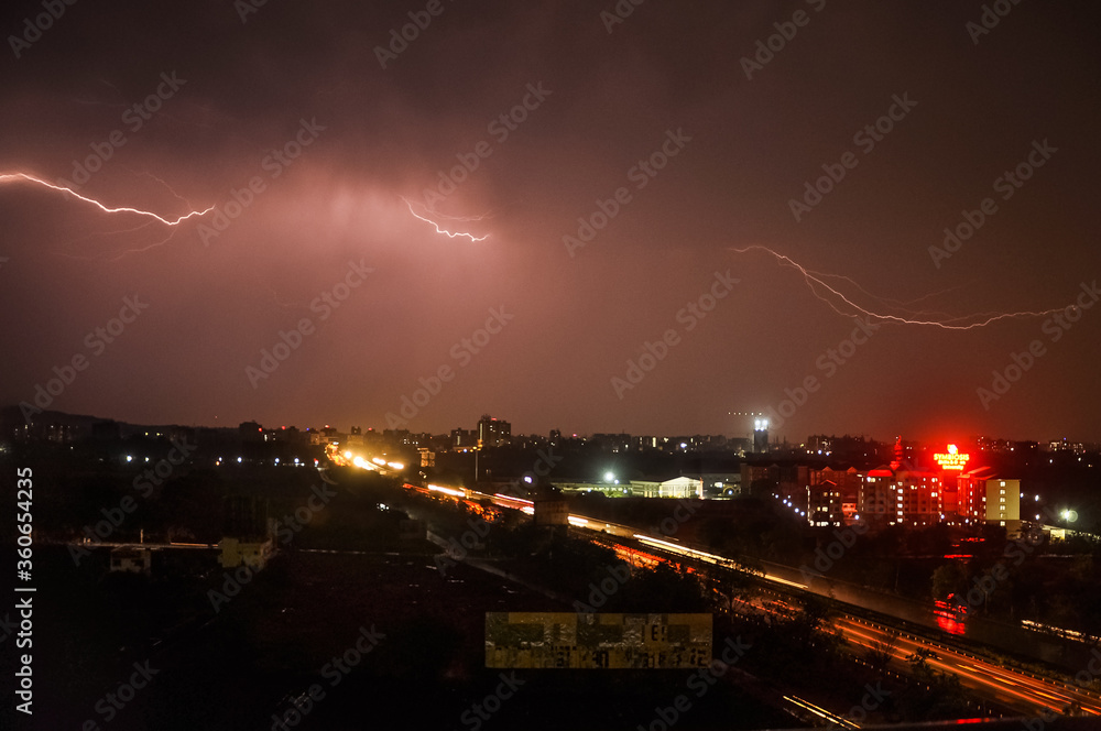Lightning storm over city in mumbai light after cyclone