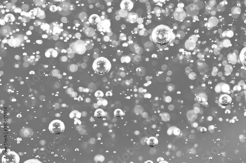 Macro bubbles of oxygen in the blood. black and white liquid. © assistant