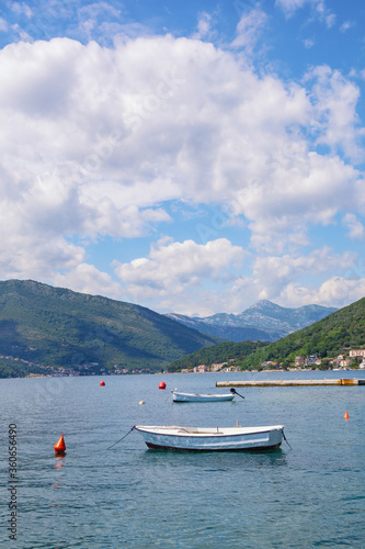 Beautiful summer Mediterranean landscape - blue sky and blue bay. Montenegro, Adriatic Sea, view of the Bay of Kotor near the city of Tivat