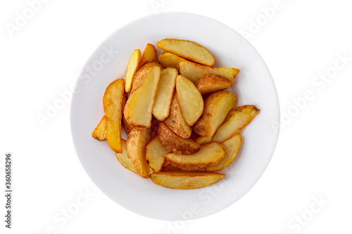 Potato wedges with peel. Golden, delicious, crispy and hearty. Fast food. Isolated on a white background.