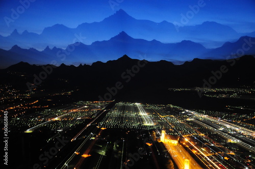 Long exposure shot of Sion by night from Veysonnaz. photo