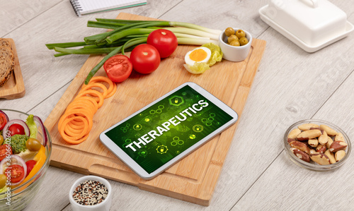 Healthy Tablet Pc compostion with THERAPEUTICS inscription, immune system boost concept