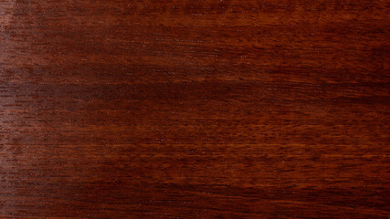 Varnished red tree with original texture. Beautiful brown wood background on lacquered textured plywood.
