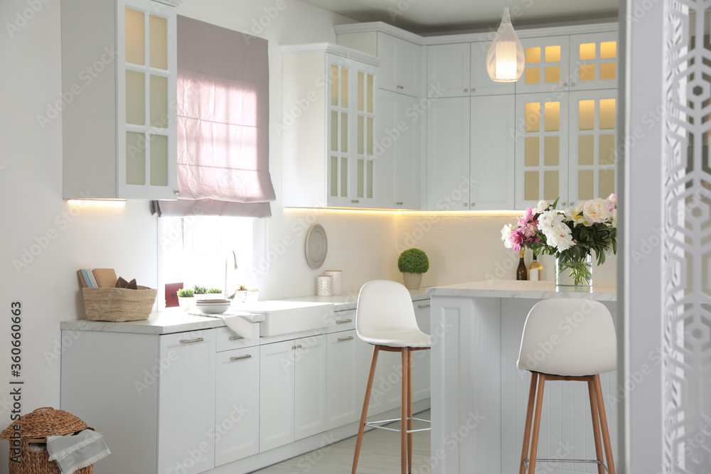 Fototapeta premium Modern kitchen with stylish furniture. Interior design
