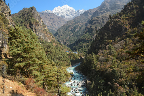 The first view of Thamserku while hiking along the Dudh Koshi river in Nepal.
