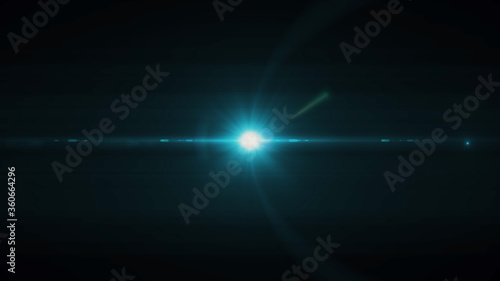 Anamorphic lens flare from a photo camera lens. Anamorphic background. © combo1982
