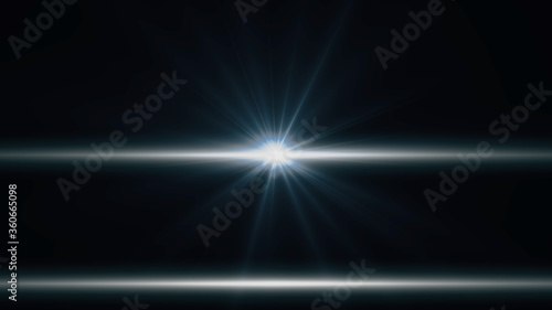 Anamorphic lens flare from a photo camera lens. Anamorphic background.