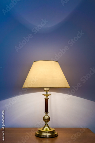 Table lamp near wall