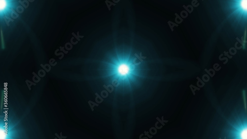 Beautiful lens flare with rays on a black background.