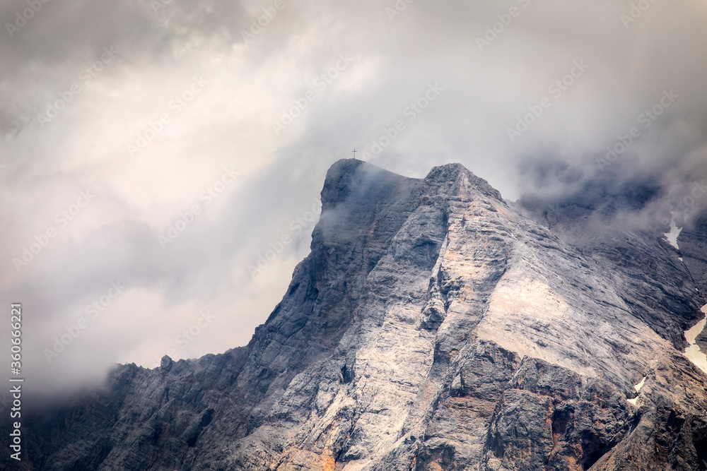 mountain rocky peak in clouds