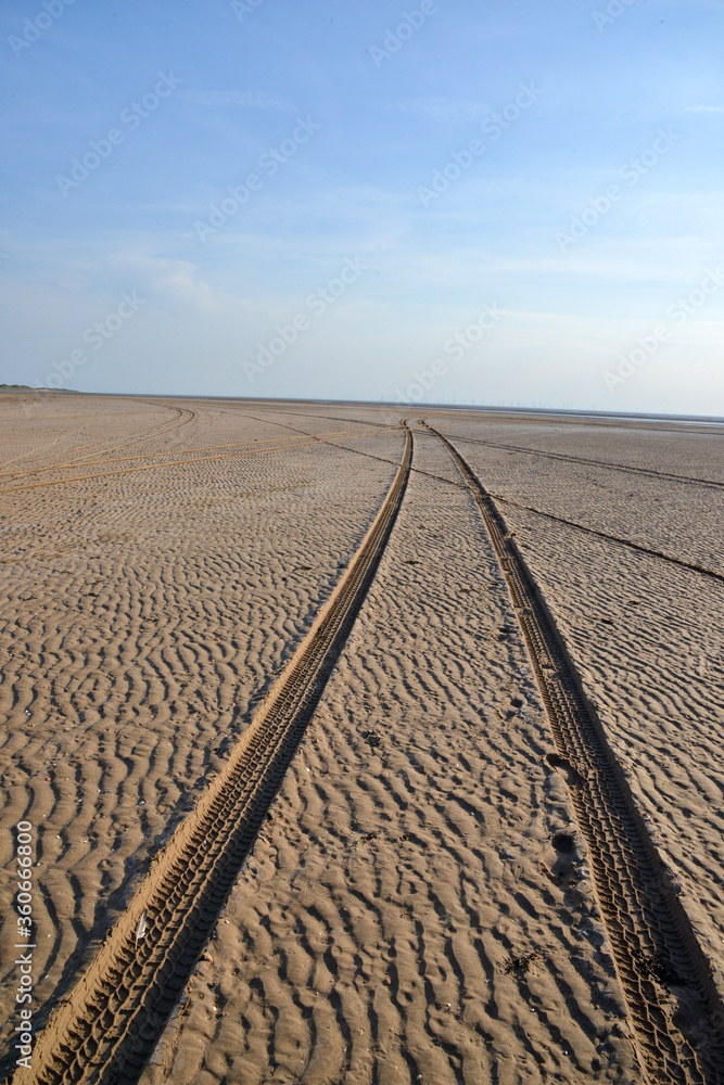 Naklejka premium Tyre Tracks on the beach at Sandscales, near Barrow in Furness, Cumbria, England, UK