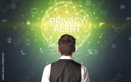 Rear view of a businessman with PRIVACY ALERT inscription, online security concept