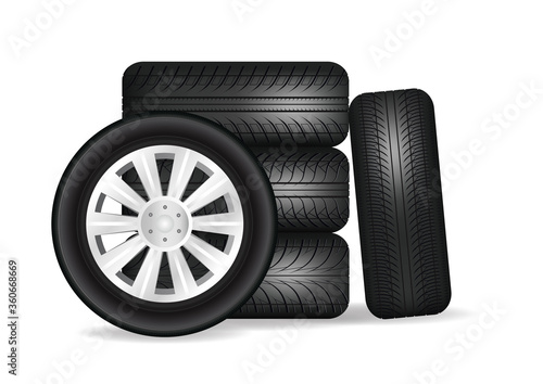 Stacked car wheels.