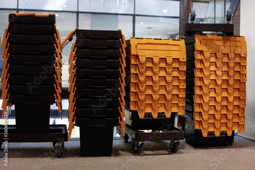 Stack of empty crates in preparation for corporate relocation 