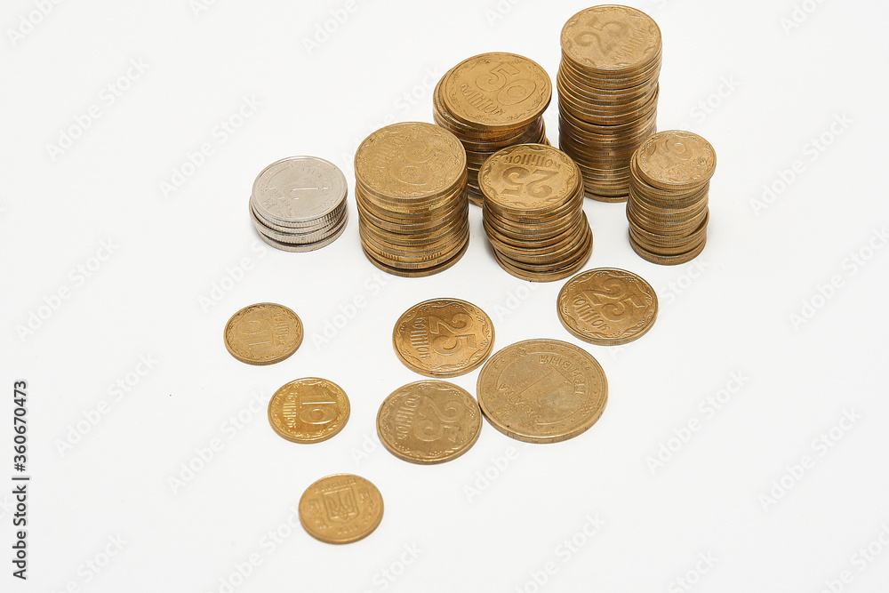 Stacks of coins on a white background. Stacks of coins on a white background.