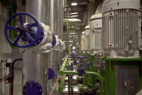 Daytime general view of the process pipelines for the supply of water and steam. General view of the process pipelines. General view of the pipes.