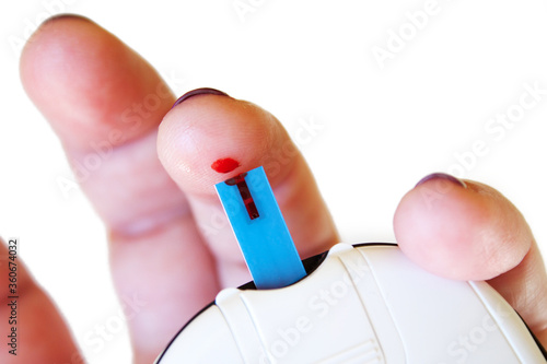 Obraz na plátně Self-monitoring of blood sugar with a glucometer