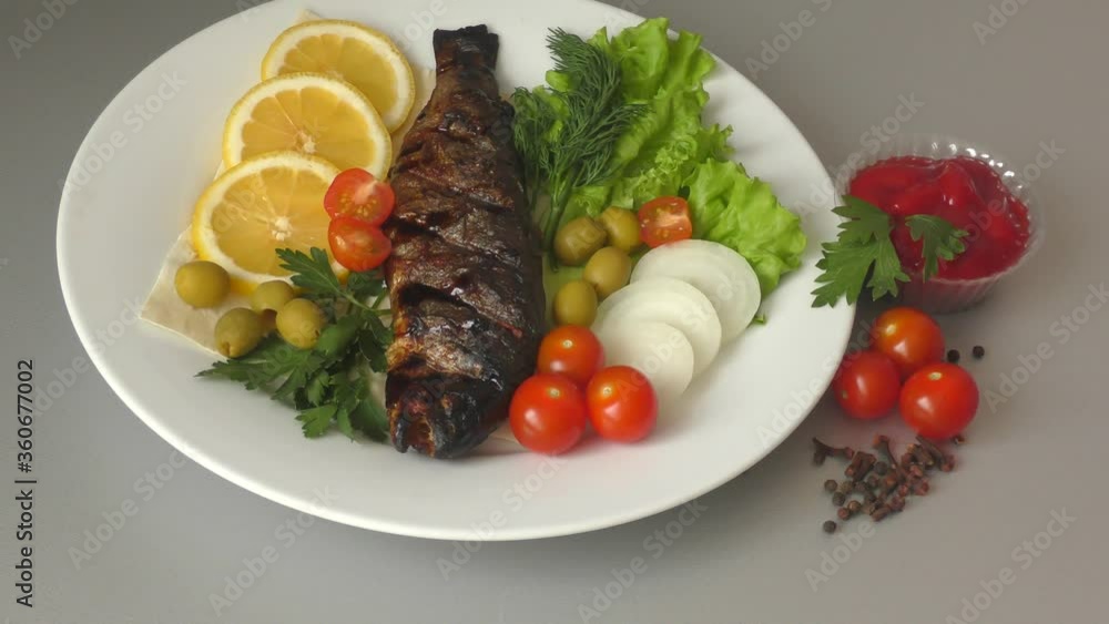 Trout in Mediterranean cuisine with fresh vegetables Trout in Mediterranean cuisine with fresh vegetables