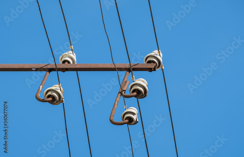 cable clutter on electric pole and street lamp