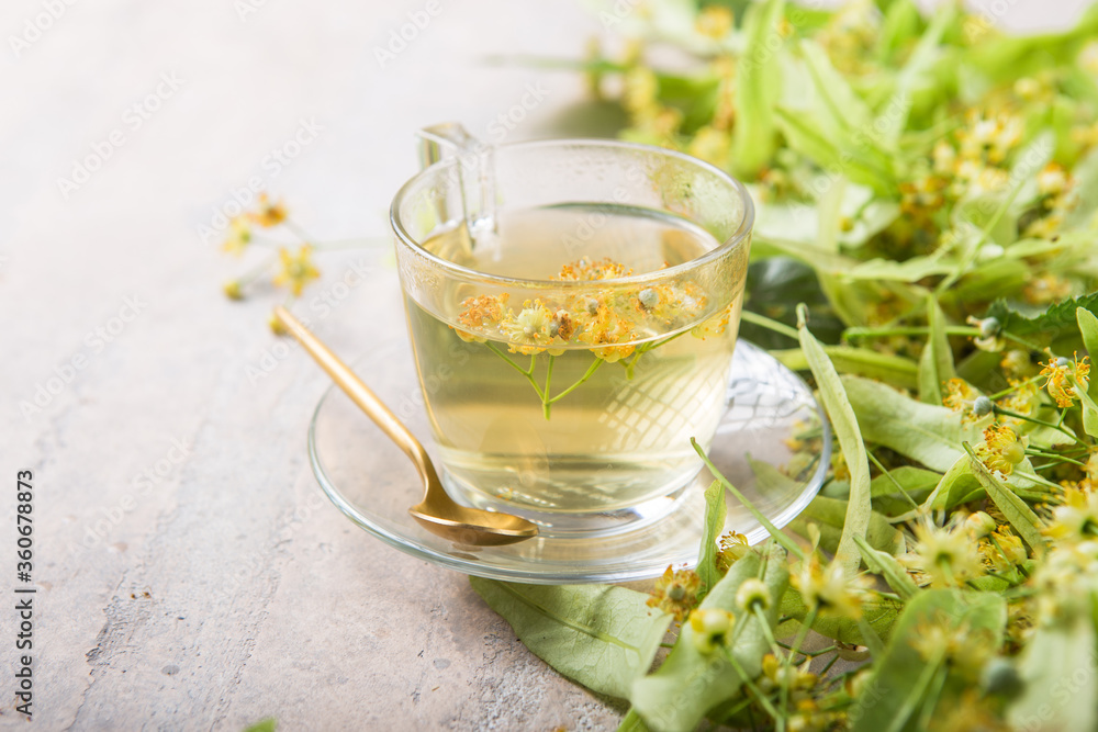 Glass Of Herbal Tea With Linden Flowers Glass Of Herbal Tea With Linden Flowers
