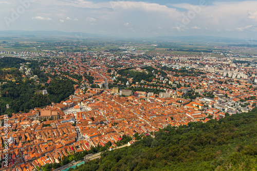 BRASOV, ROMANIA - Circa 2020: aerial view of old town center in Brasov Romania. Concept of old medieval town in eastern center Europe. Tourist must see.