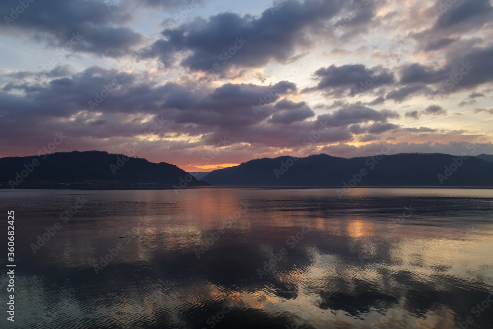 custom made wallpaper toronto digitalAmazing natural landscapes, Beautiful colorful sunrise, sunset with hills on the background and reflection on the Danube River in Orsova, Romania.