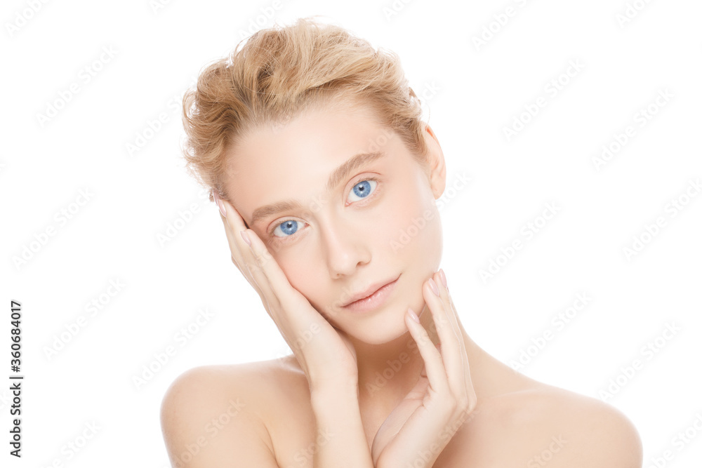Beauty woman with blue eyes and blond hair looking at camera, isolated on white background. Beautiful model girl with perfect clean fresh skin touching her face Beauty woman with blue eyes and blond hair looking at camera, isolated on white background. Beautiful model girl with perfect clean fresh skin touching her face