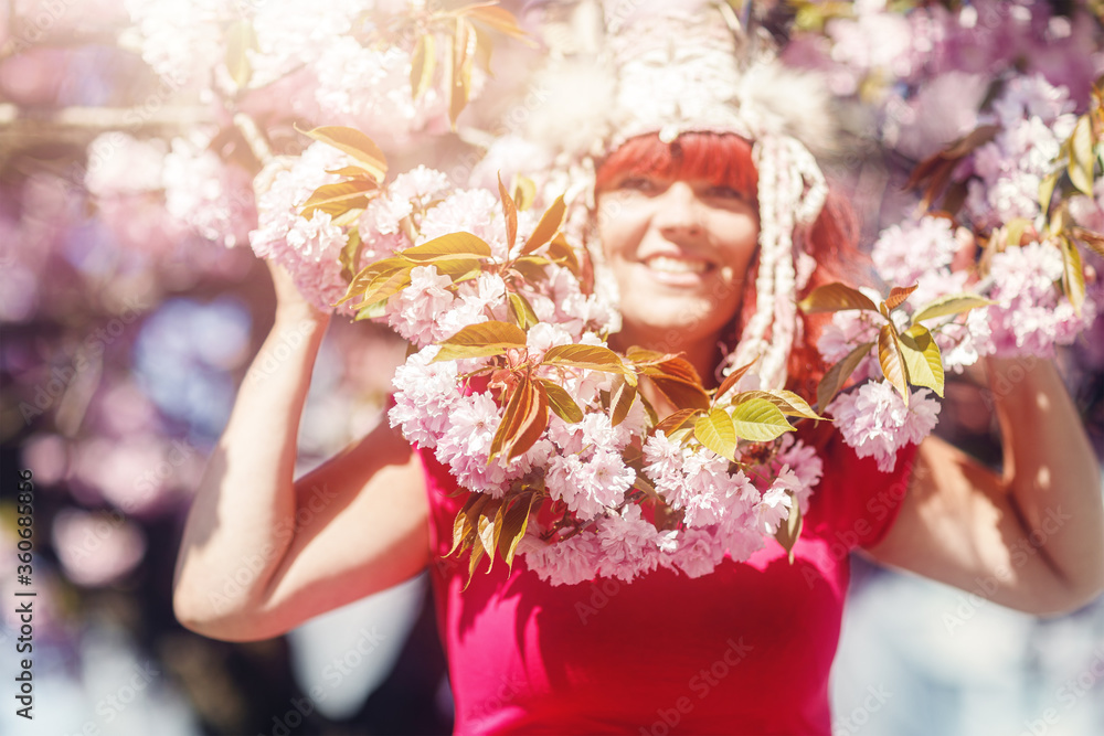 Obraz premium beautiful shamanic woman with headband in the nature.