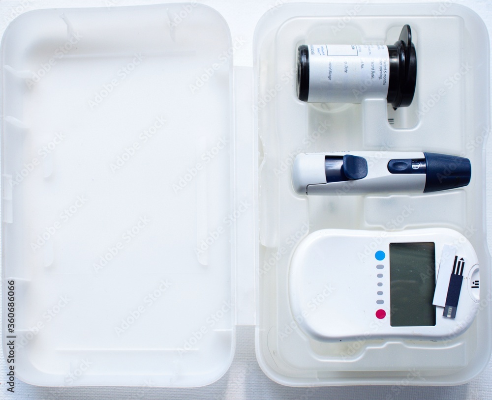 Diabetes testing kit with monitor devise, picker and lancets Diabetes testing kit with monitor devise, picker and lancets