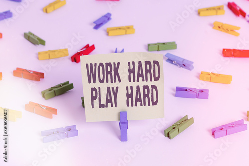 Word writing text Work Hard Play Hard. Business photo showcasing diligent in any activity Party at weekends Hardworking Colored clothespin papers empty reminder white floor background office photo