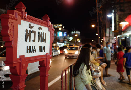Vintage signs in Hua Hin with people at the street food market, famous tourist spots in Thailand