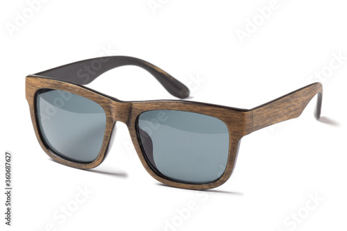 Wooden sunglasses isolated on white background