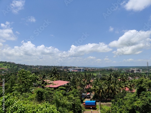 Wonderful Day With White-Blue Sky And Green CityTown Of Goa. photo