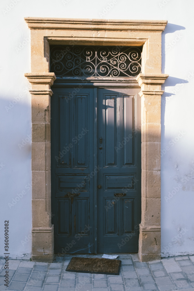 old wooden door in a stone wall