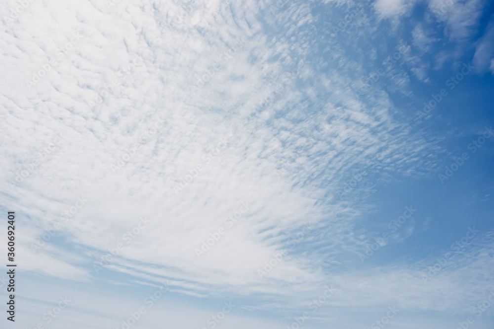 extremely cloudy blue sky background 