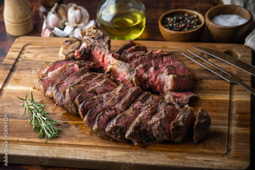 thick cut t-bone steak with serving cut style